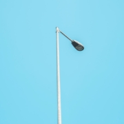 black street light under blue sky during daytime